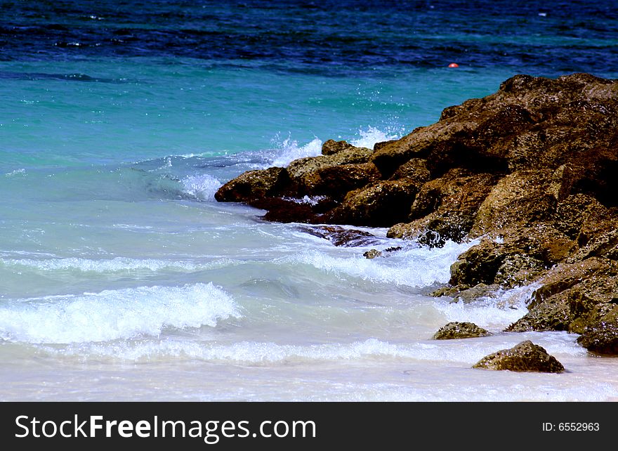 Water splashing off rocks in the Bahamas. Water splashing off rocks in the Bahamas.