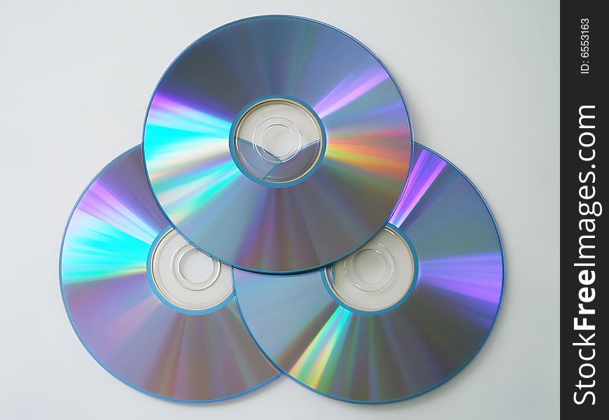 Three compact discs with reflects