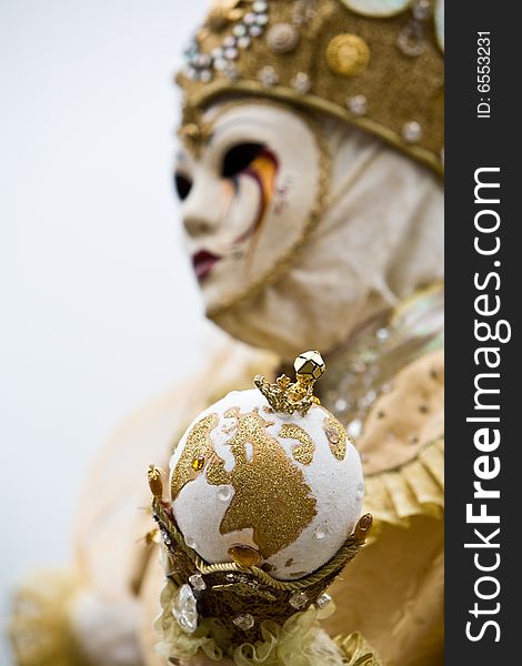 White and gold costume at the Venice Carnival. White and gold costume at the Venice Carnival