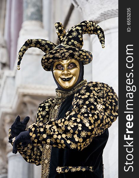 A joker costume at the Venice Carnival. A joker costume at the Venice Carnival
