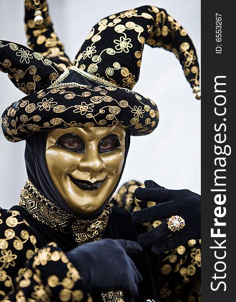 A joker costume at the Venice Carnival. A joker costume at the Venice Carnival