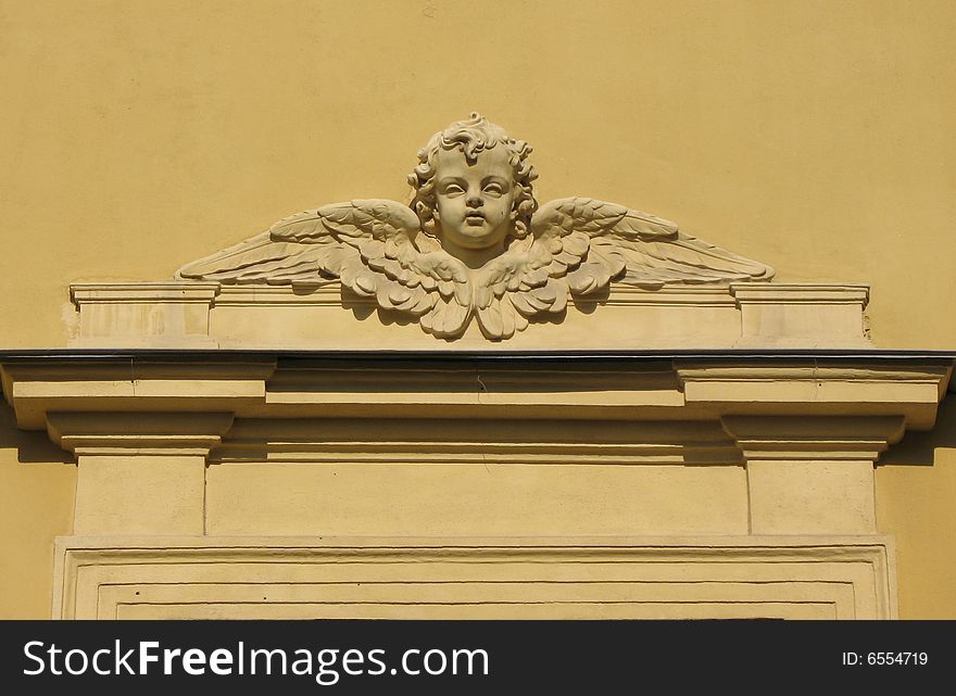 The Petropavlovsky cathedral. A bás-relief over the window. An angel's head