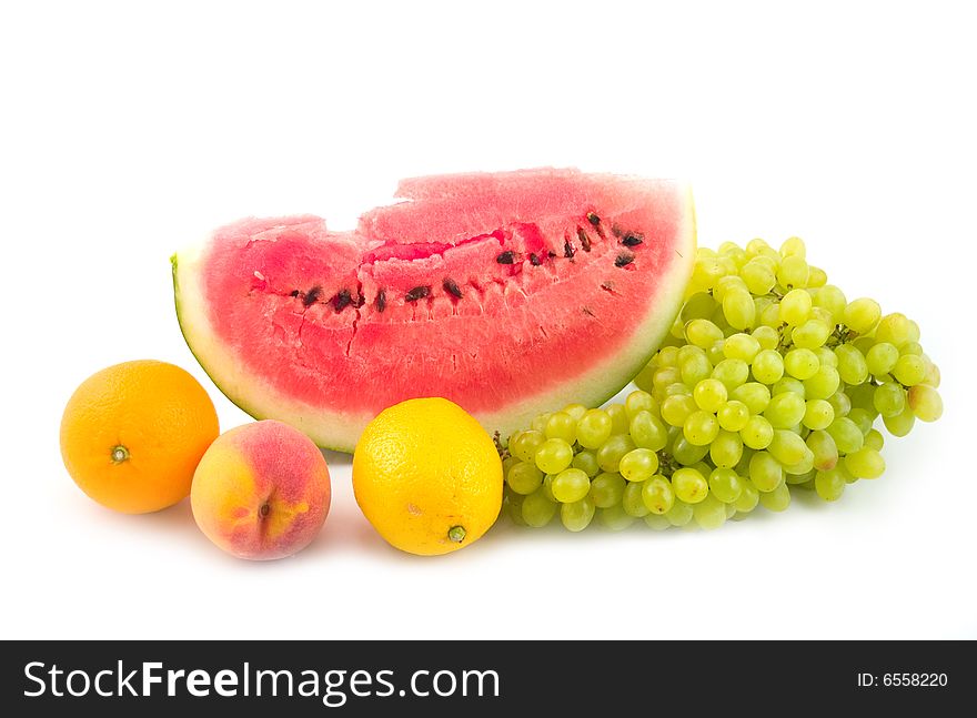 Watermelon and grapes peach orange lemon