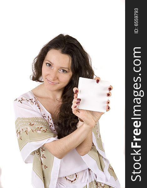 Young woman with tablet in her hands on white ground