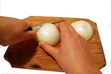 Hands Cutting Onion On A Table Royalty Free Stock Images Hands Cutting Onion On A Table Royalty Free Stock Images