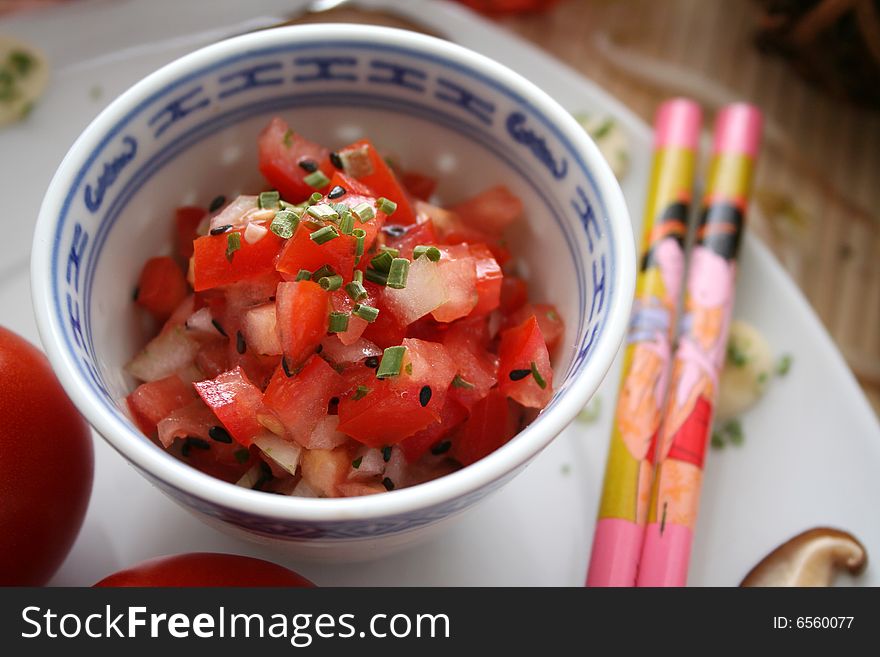 A fresh salad of tomatoes and some spices