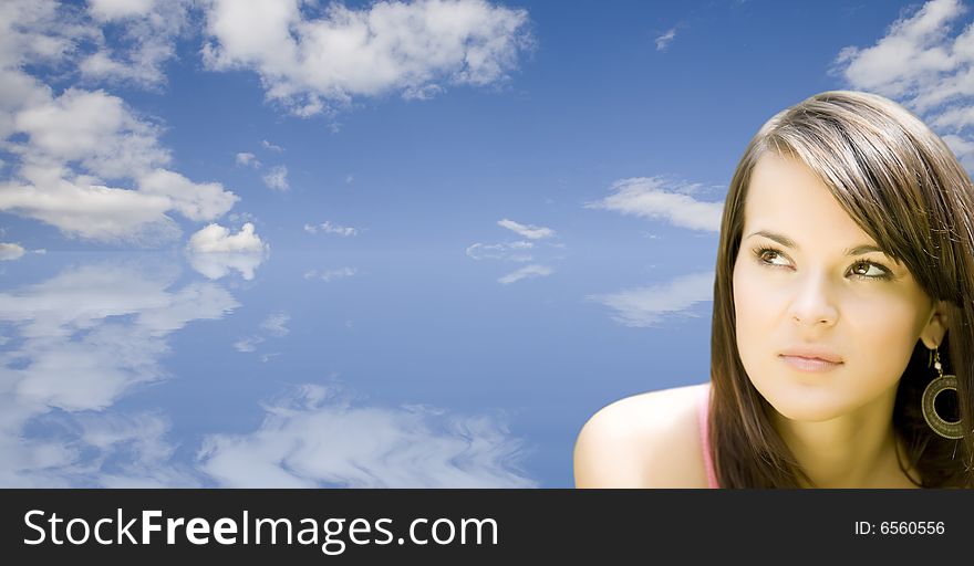 Young Woman On The Sky Background. Young Woman On The Sky Background