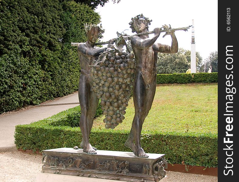 Bronze statues of carrier of grapes