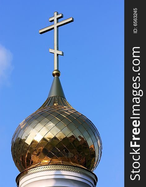 Domes of orthodox church on a blue sky background. St.Petersburg, Russia