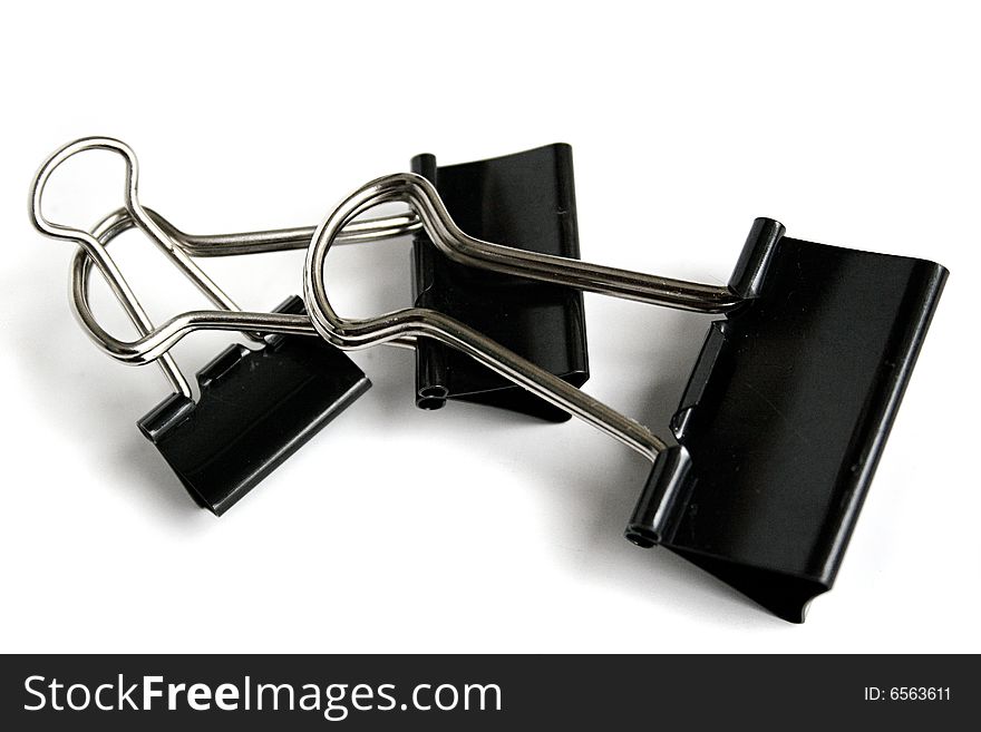 An image of 3 office clips of different sizes