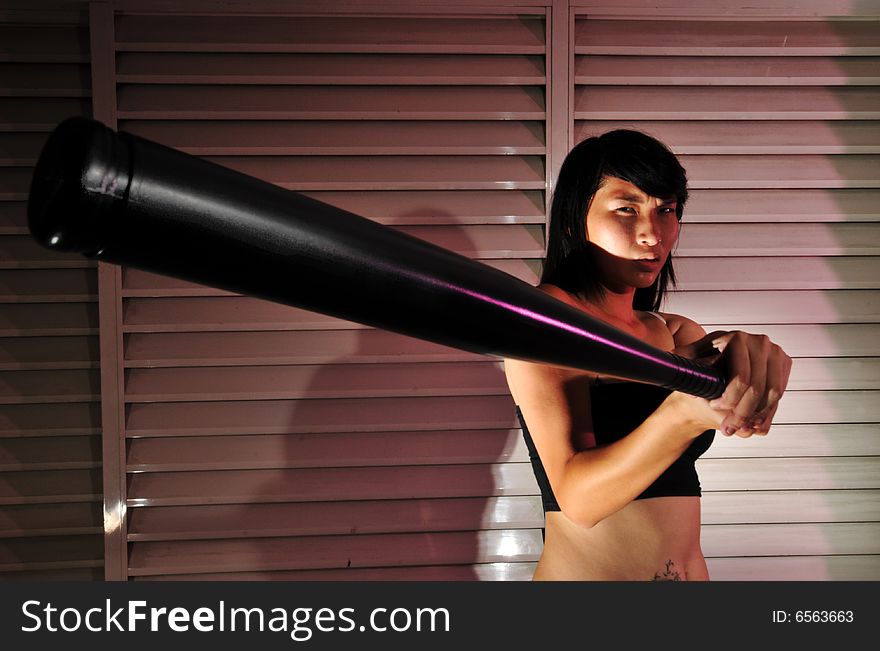 Girl behaving badly. Gangster girl using weapon, violence. Useful for depicting such images or showing rebellious youth. Girl behaving badly. Gangster girl using weapon, violence. Useful for depicting such images or showing rebellious youth.