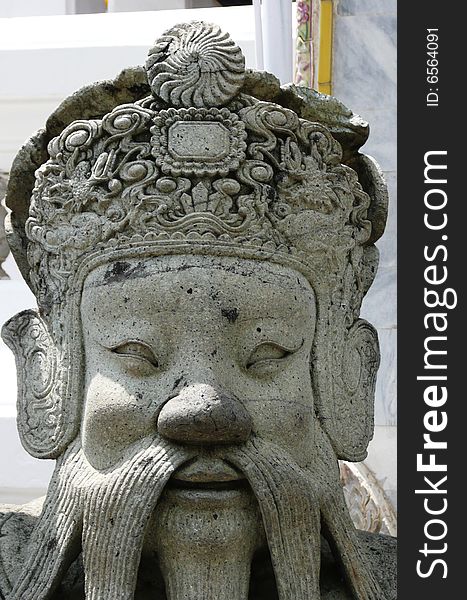Royal Palace bangkok mask warrior statue with spade. Royal Palace bangkok mask warrior statue with spade