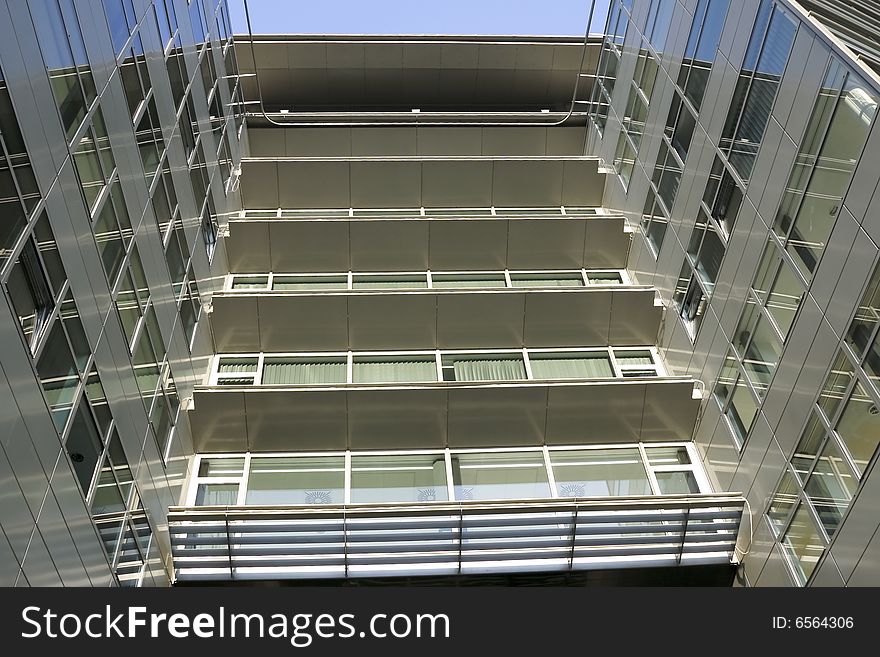 Modern glass building in sunshine