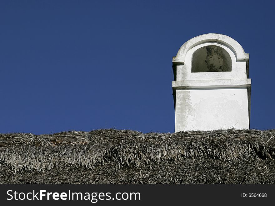 Old white chimney on a ta. Old white chimney on a ta