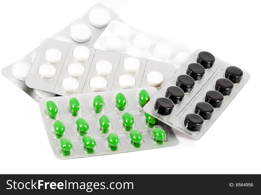 Several types of pills in their packages. Several types of pills in their packages