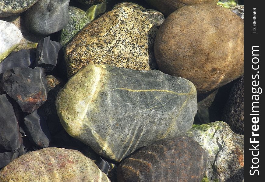 Many stones directly below the water line. Many stones directly below the water line