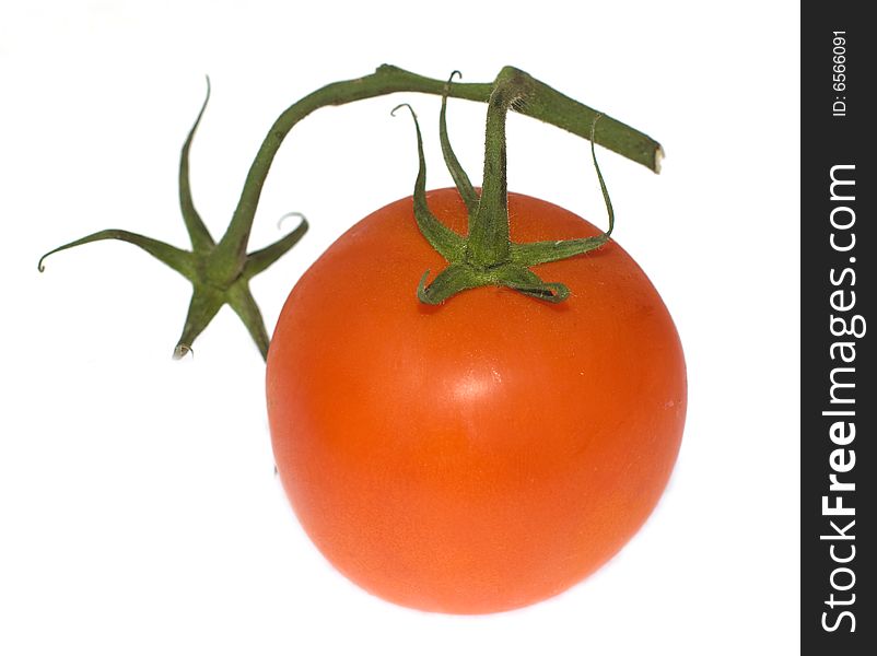 Red tomato with green stick.