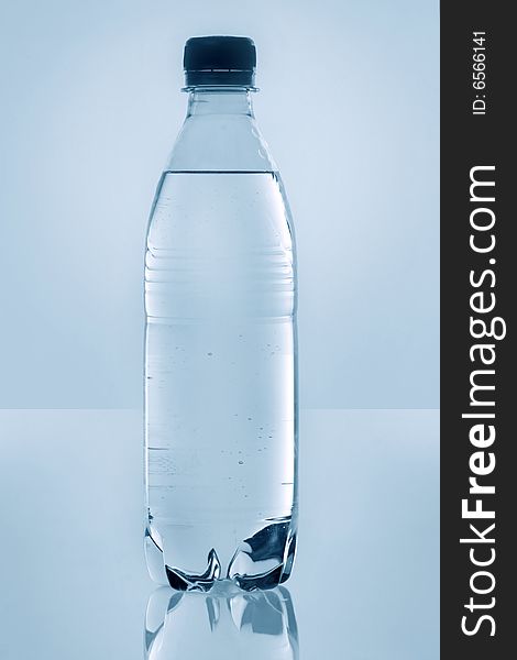 Isolated Generic Plastic Bottled Water with No Label, with a bit of reflection. Isolated Generic Plastic Bottled Water with No Label, with a bit of reflection.