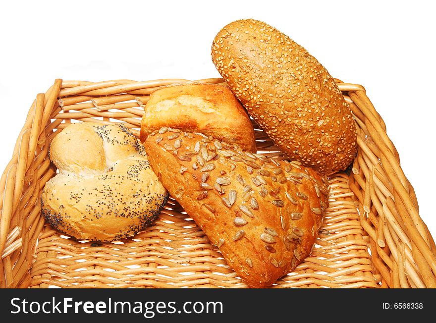 Assorted bread rolls in a wicker basket. Assorted bread rolls in a wicker basket