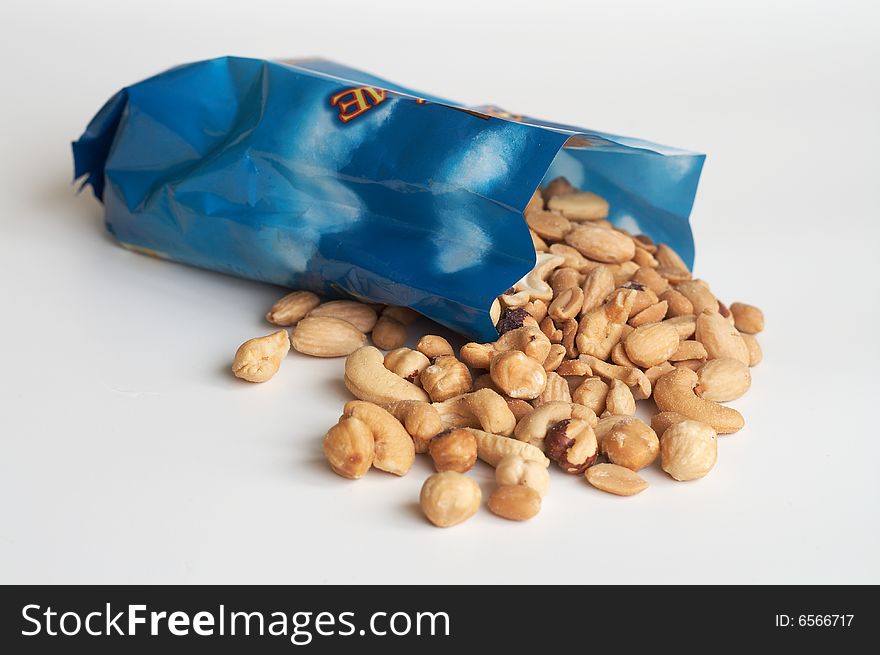 Mixed nuts and almonds close up with white background. Mixed nuts and almonds close up with white background