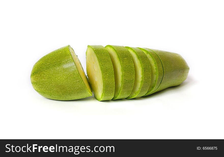 Raw cut zucchini isolated on white background