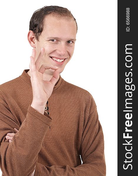 Young caucasian man wearing trendy clothes showing an ok sign with his hand. Isolated on white background