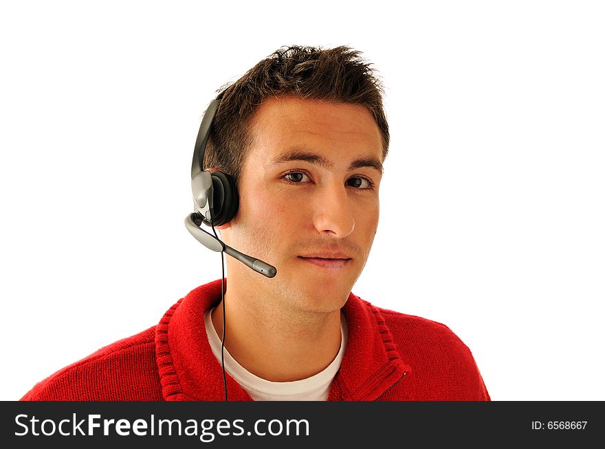Handsome young man with hands-free headset isolated on white background. Handsome young man with hands-free headset isolated on white background