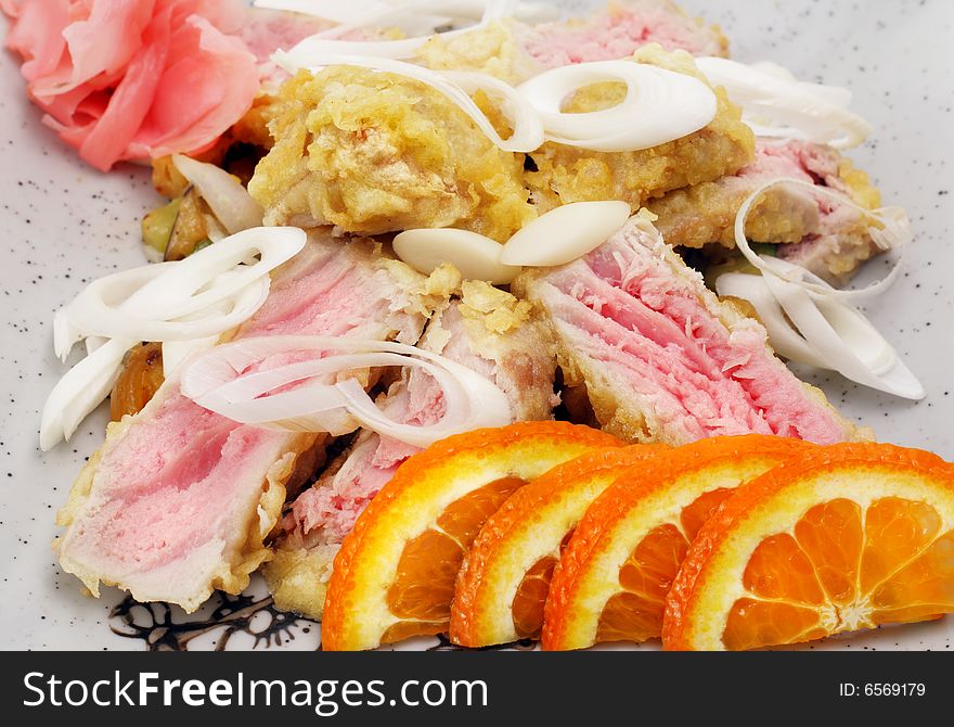 Japan Salad from Tuna Fish, Rice, Vegetables and Orange Slice. Isolated on White Background