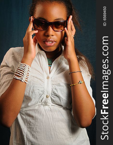 Portrait of young african american fashion woman with sunglasses. Portrait of young african american fashion woman with sunglasses