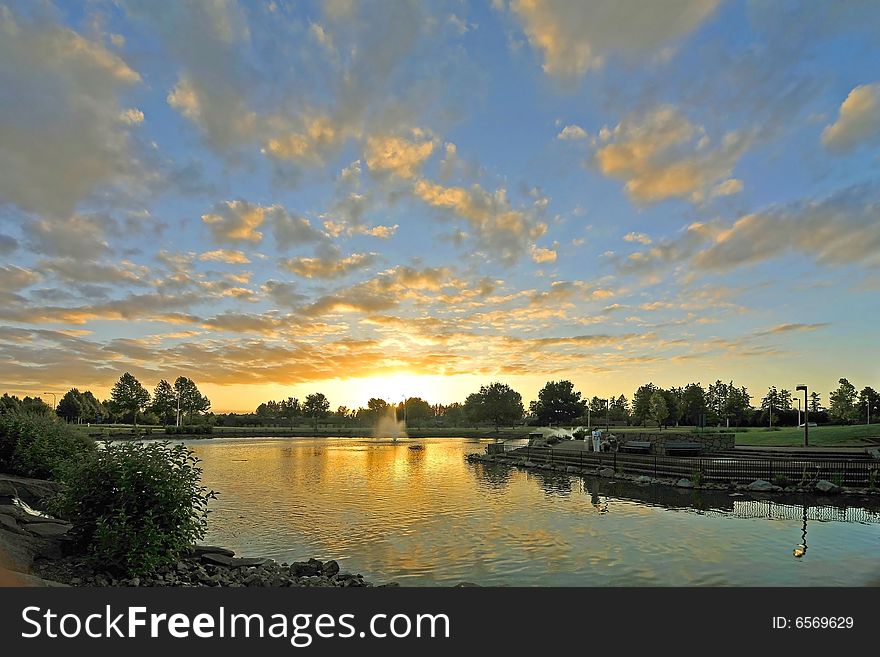 Pond at dusk with reflection on the water