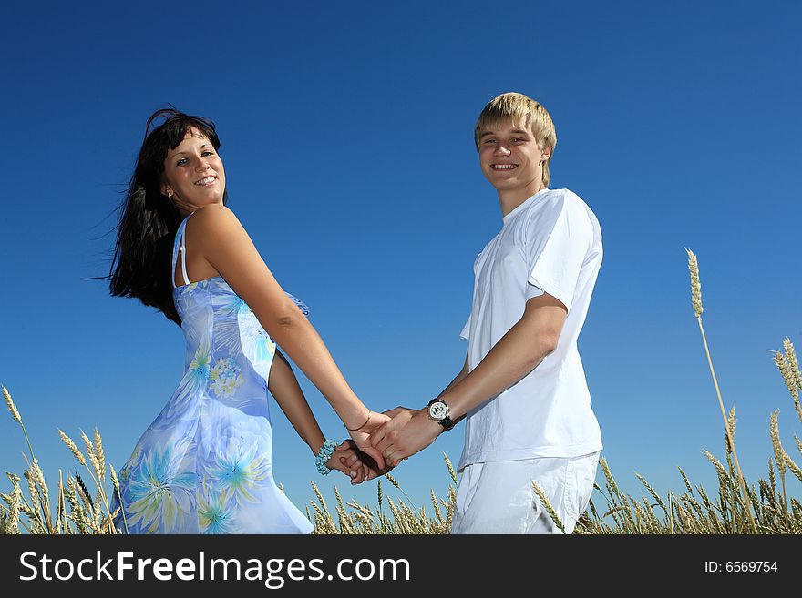 Beautiful couple relax outdoor summer. Beautiful couple relax outdoor summer