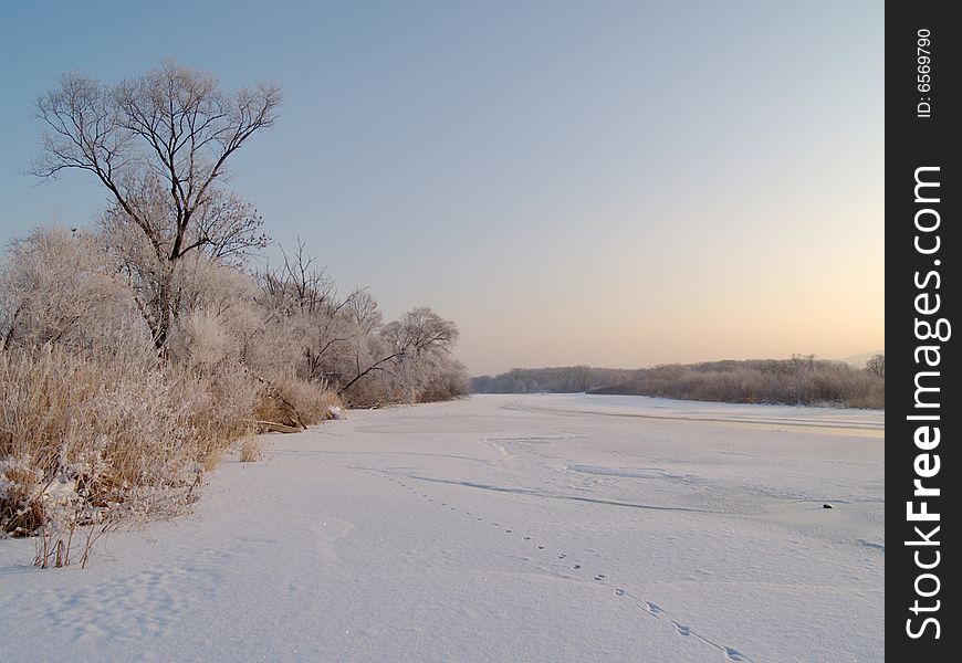 On ice of the frozen river Ussuri