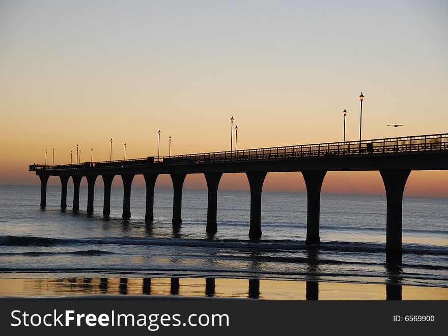 Sunrise at New brighton pier, New Zealand.