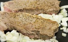 Strip Steaks In Pan With Onions Stock Images Strip Steaks In Pan With Onions Stock Images
