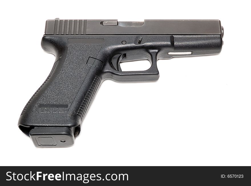 Handgun isolated over a white background