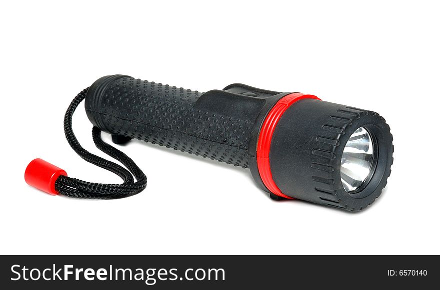 Electric torch isolated over a white background