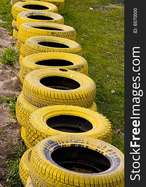 Yellow old tyres textured background