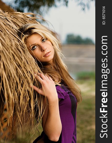 Portrait of beautiful woman with hay. Portrait of beautiful woman with hay