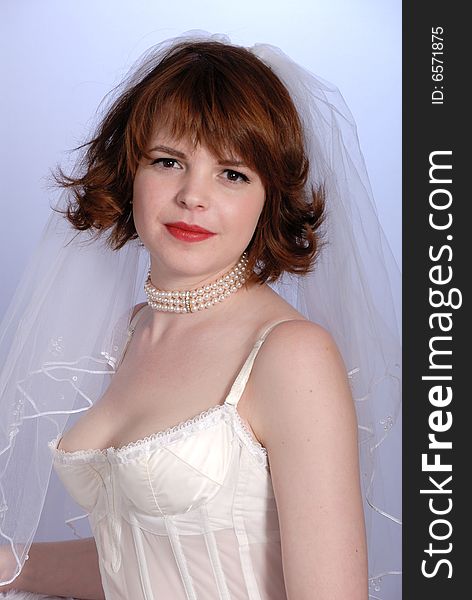 Cute retro fifties bride in lingerie