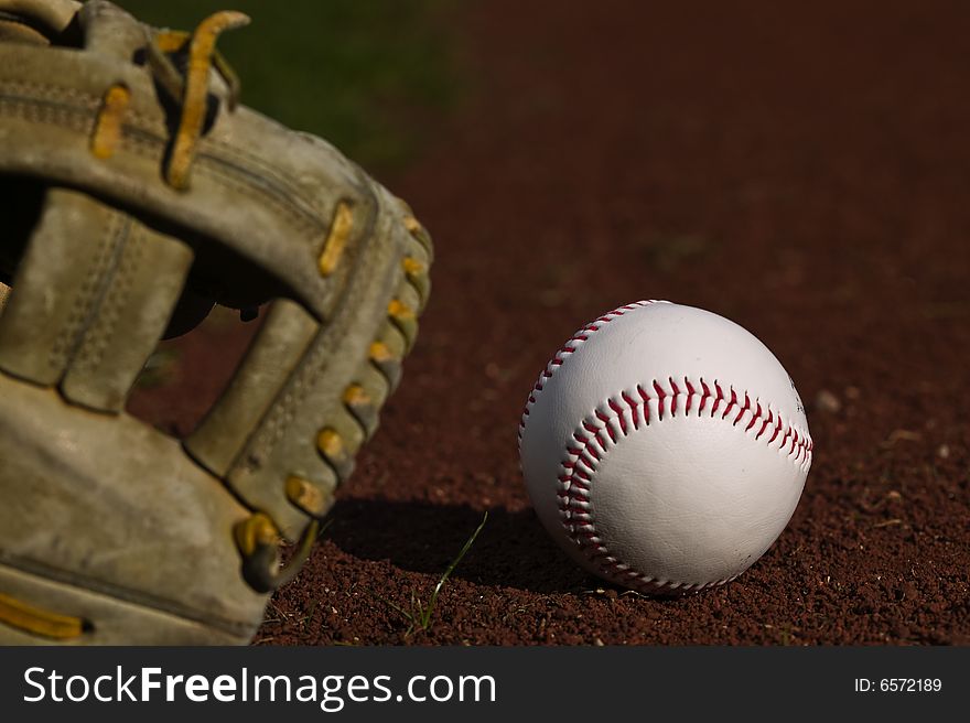 Baseball In Glove On The Field