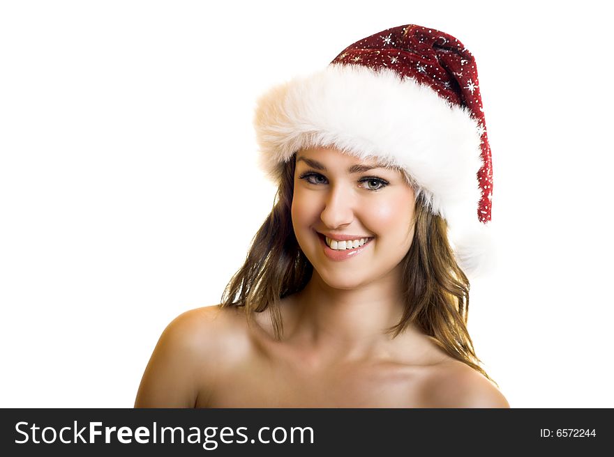 Isolated portrait of a beautiful young smiling woman with a christmas cap. Isolated portrait of a beautiful young smiling woman with a christmas cap