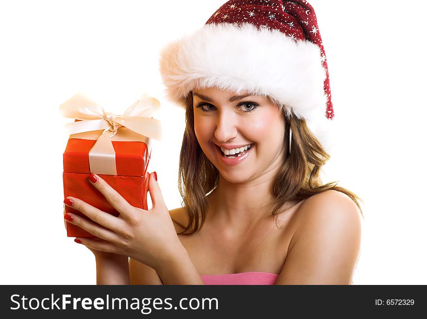 Winter portrait of a beautiful young smiling woman with a christmas cap. Winter portrait of a beautiful young smiling woman with a christmas cap