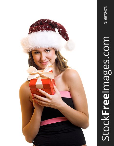 Winter portrait of a beautiful young smiling woman with a christmas cap. Winter portrait of a beautiful young smiling woman with a christmas cap