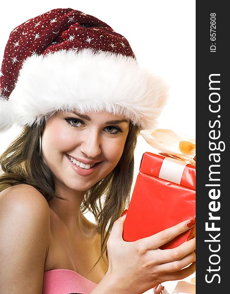 Winter portrait of a beautiful young smiling woman with a christmas cap. Winter portrait of a beautiful young smiling woman with a christmas cap