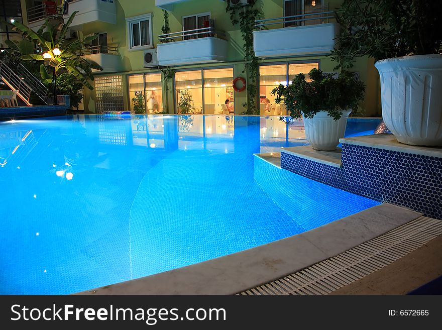 Blue swimming pool.