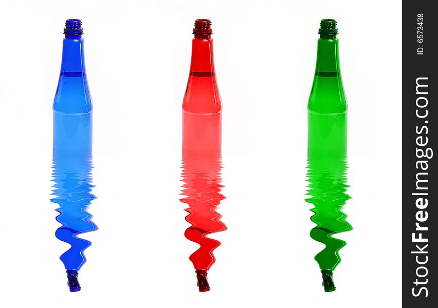 Three colour plastic bottles on the white. Three colour plastic bottles on the white