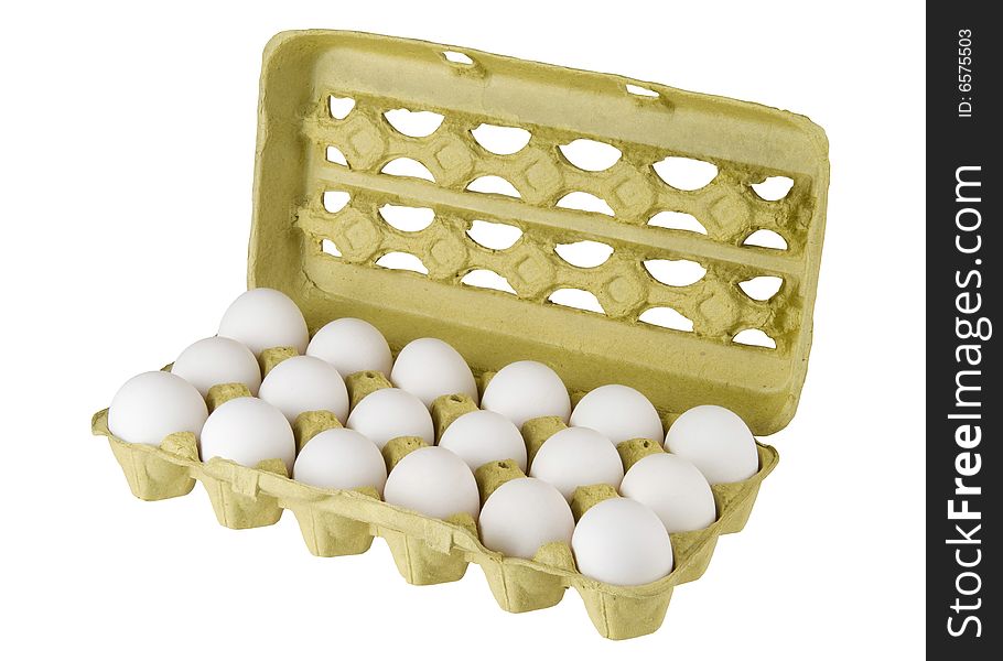 Some fresh white eggs in cardboard