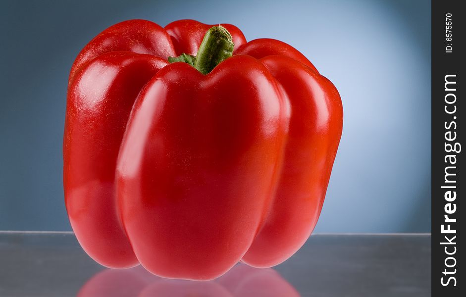 A fresh red pepper close up