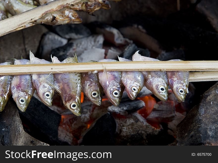 Fish grill with coal