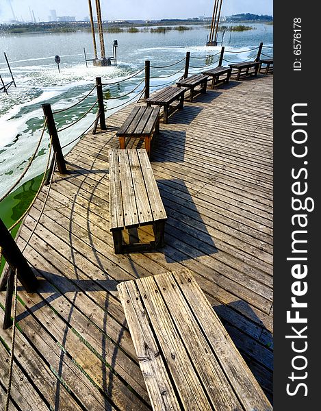 Bench on lake shore